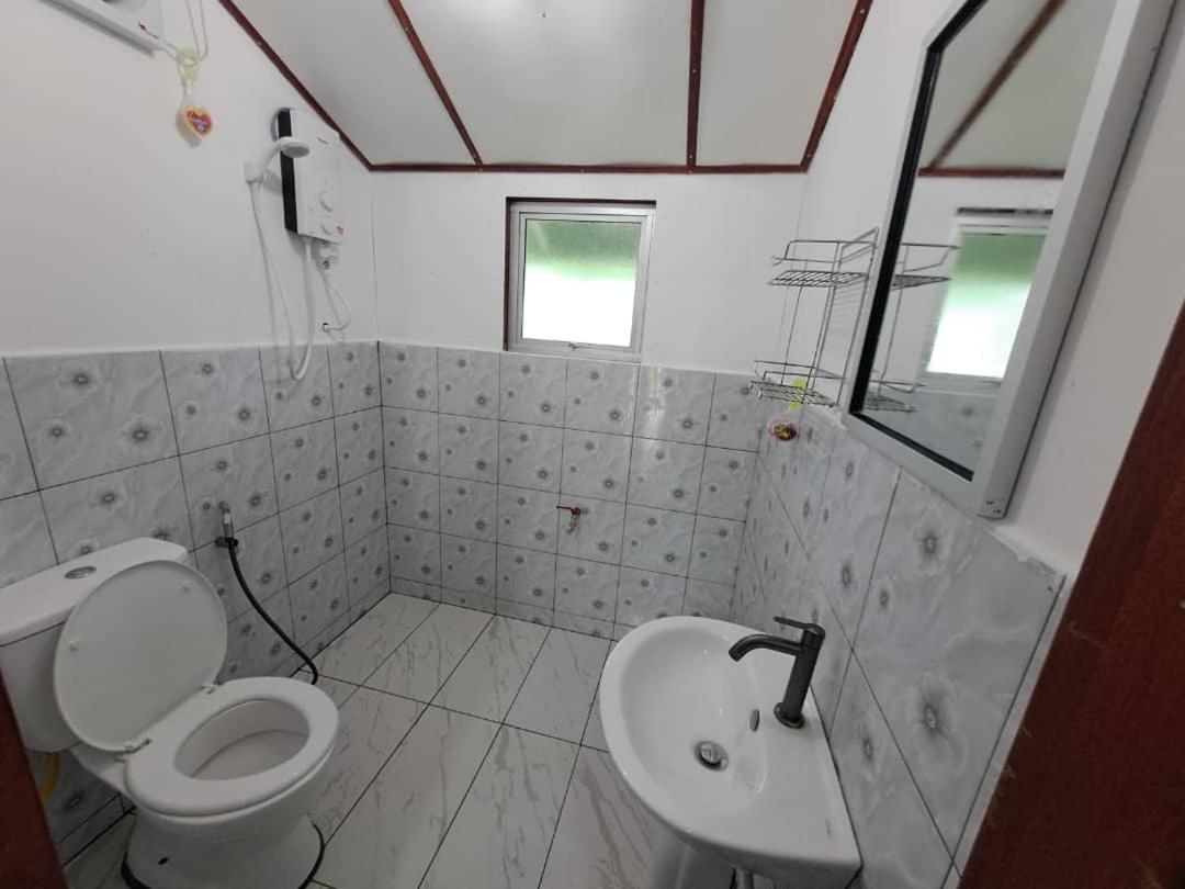 Sukau Backpackers Bed & Breakfast Exterior foto